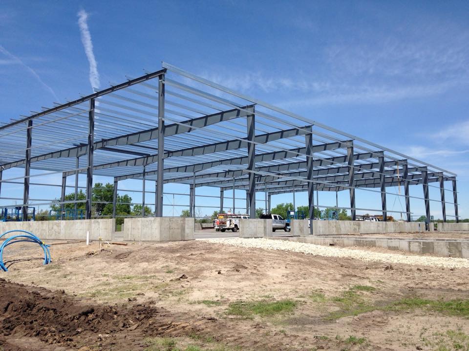 Pre-engineered metal building frame under construction